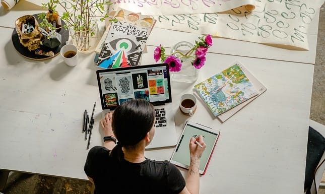 Woman making designs for online business startup